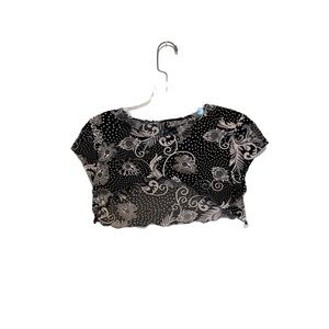 Cute crafted pelerine cover up! Soft material and covered in flowers + gems.